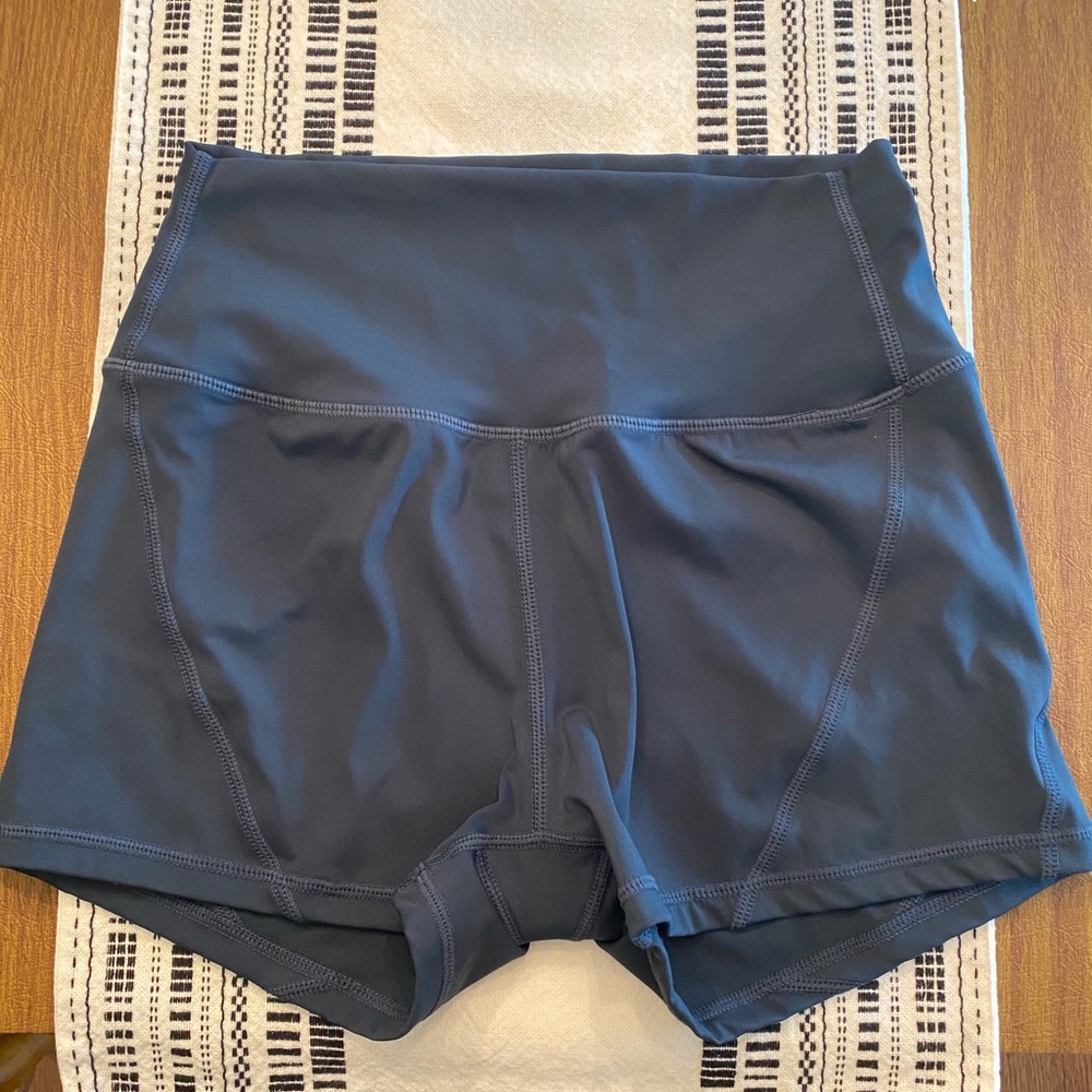 Never worn but took tags off. Size medium dark teal